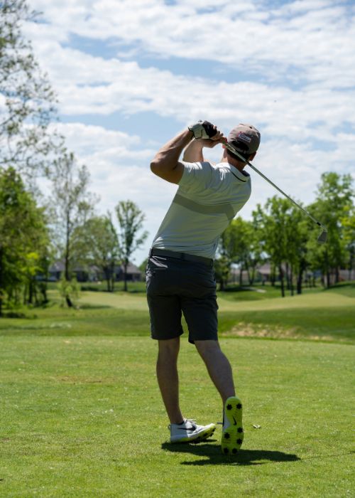 golf player on ile d'orleans in quebec